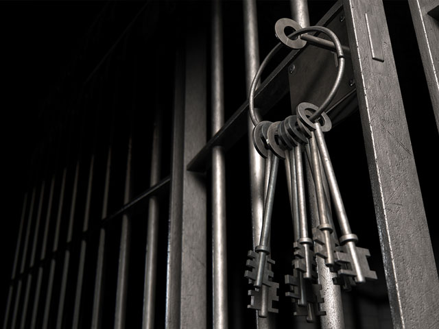 jail keys on ring in cell door silver black felony