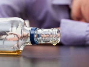 public drinking empty bottle on side