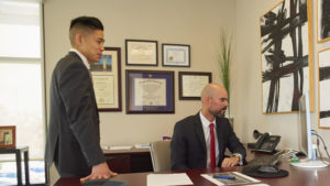 Kyle Morishita and Juan de Pedro in law office